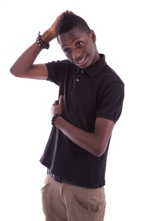 Portrait of a young african teenager smiling, isolated on whiteの写真素材