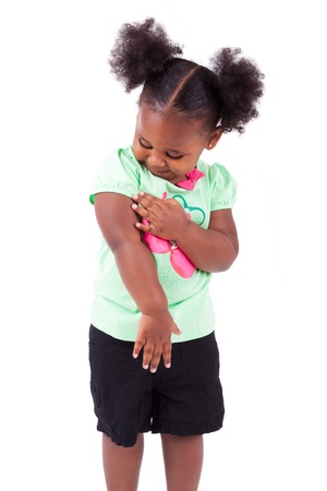 Cute little african american girl, isolated on white backgroundの写真素材