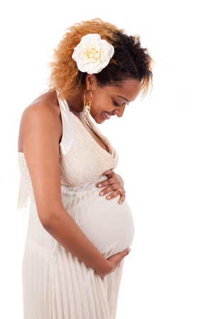 Young beautiful pregnant african woman , over white backgroundの写真素材
