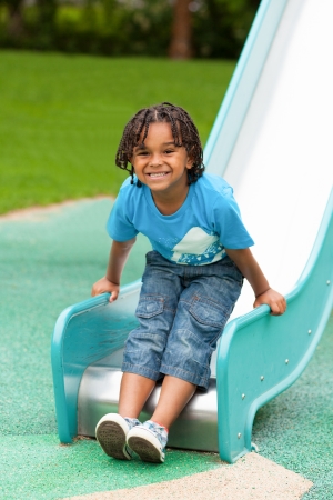 Outdoor portrait of a cute african american little boyの写真素材