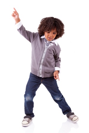 Little african american boy dancing,isolated on white backgroundの写真素材
