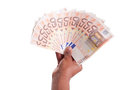 African hand holding money, isolated on white backgroundの写真素材