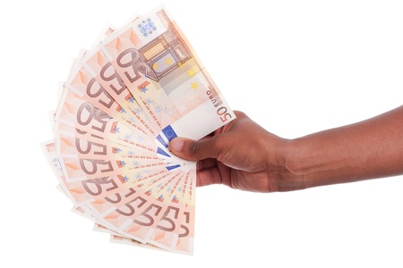 African hand holding money, isolated on white backgroundの写真素材