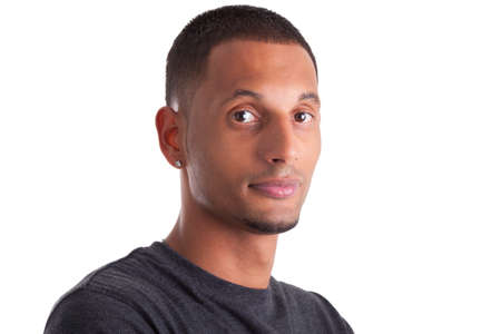 Close up portrait of a young african american man, isolated on white backgroundの写真素材