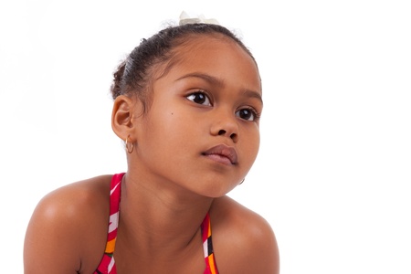 Portrait of a cute young African Asian girl,isolated on white backgroundの写真素材