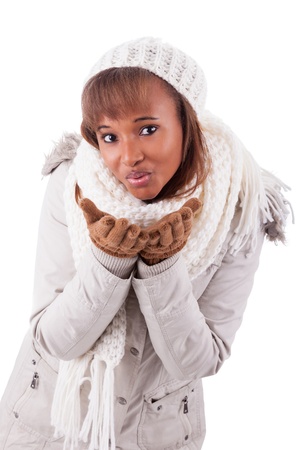 Young african american woman wearing winter clothes, isolated on white backgroundの写真素材