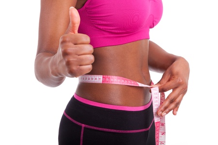African American Fitness woman making thumbs up, isolated on white backgroundの写真素材