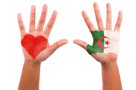 African hands with a painted heart and algerian flag, i love algeria concept, isolated on white backgroundの写真素材