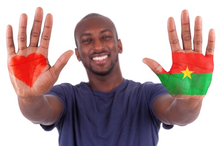 African man hands with a painted heart and burkinabe flag, i love burkina faso concept, isolated on white backgroundの写真素材