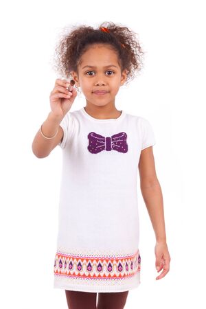 Young african asian girl holding  a paint brush,isolated on white backgroundの写真素材