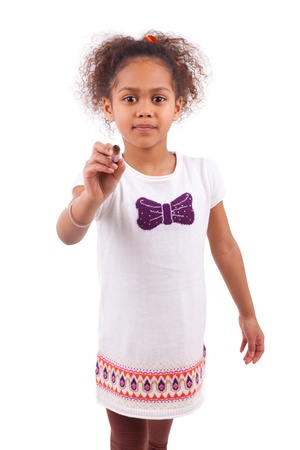 Young african asian girl holding  a paint brush,isolated on white backgroundの写真素材
