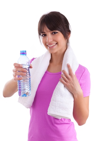 Young caucasian woman holding a bottle of water  over white backgroundの写真素材