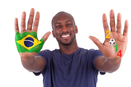 Brazilian man hands with a painted heart and brazilian flag, i love brazil concept, isolated on white background concept, isolated on white backgroundの写真素材