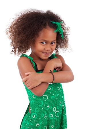 Portrait of a cute young African Asian girl,isolated on white backgroundの写真素材