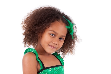 Portrait of a cute young African Asian girl,isolated on white backgroundの写真素材