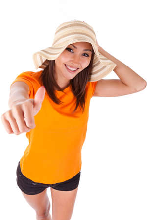 Portrait of a young beautiful asian woman making thumbs up isolated on white background - Asian peopleの写真素材