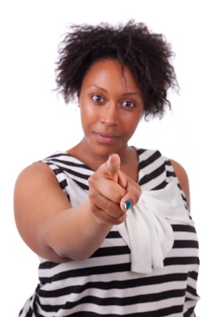 Young black woman pointing to the screen, isolated on white background - African peopleの写真素材