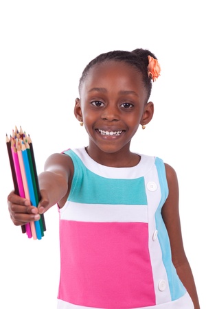 Cute black african american little girl holding color pencil, isolated on white background - African people - Childrenの写真素材