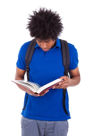 Young black teenage student men reading a books, isolated on white background - African peopleの写真素材