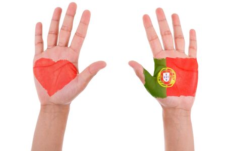Hands with a painted heart and portuguese flag, i love portugal concept, isolated on white backgroundの写真素材