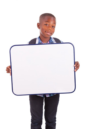 African American school boy holding a blank board, isolated on white background - Black peopleの写真素材