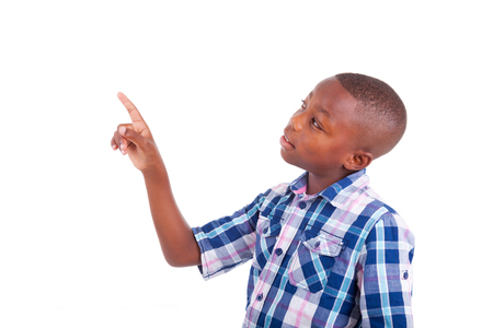 African American school boy looking up, isolated on white background - Black peopleの写真素材