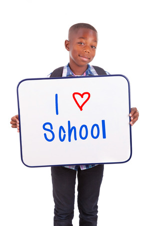 African American school boy holding a blank board, isolated on white background - Black peopleの写真素材