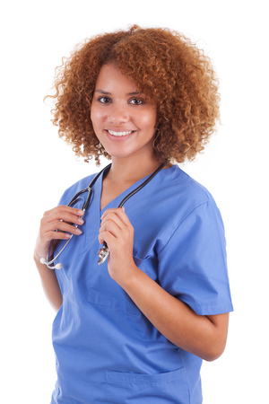 African American nurse holding a stethoscope, isolated on white background - Black peopleの写真素材