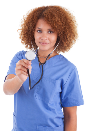 African American nurse holding a stethoscope, isolated on white background - Black peopleの写真素材