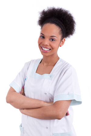 Young african american doctor with folded arms - Black people, isolated on white backgroundの写真素材