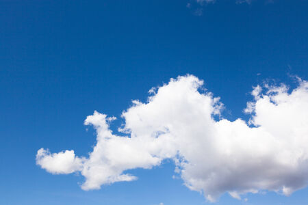 White clouds over a beautiful blue skyの写真素材