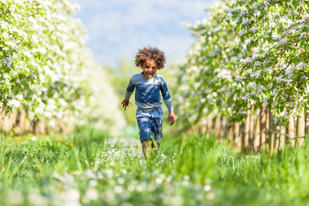 Cute african american little boy playing outdoor - Black peopleの写真素材