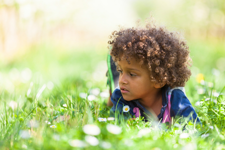 Cute african american little boy playing outdoor - Black peopleの写真素材