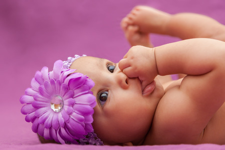 Adorable little african american baby girl looking - Black people