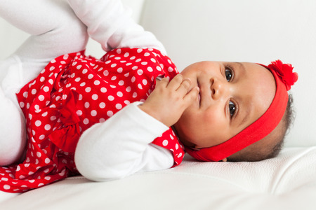 Portrait of little African American little girl smiling - Black people