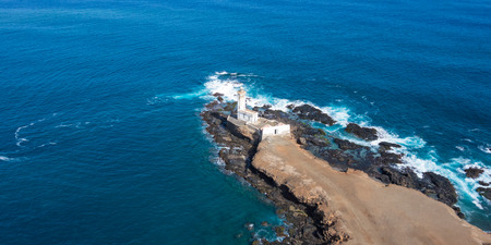 Aerial view of Ponta Temerosa lighthouse farol in the city of Praia in Santiago - Cape Verde - Cabo Verdeの写真素材