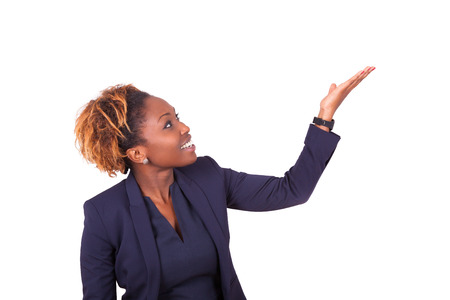 African American business woman pointing something up - Black peopleの写真素材