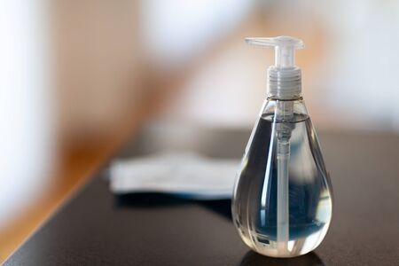 Antibacterial antiseptic hand sanitizer gel bottle and surgical masksの写真素材