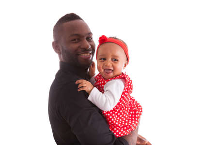 Young african american father holding with her baby girlの写真素材