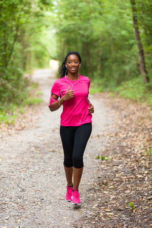 African american woman jogger portrait - Fitness, people and healthy lifestyleの写真素材