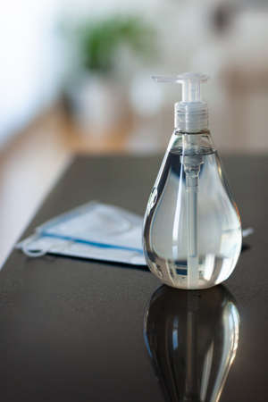 Antibacterial antiseptic hand sanitizer gel bottle and surgical masksの写真素材