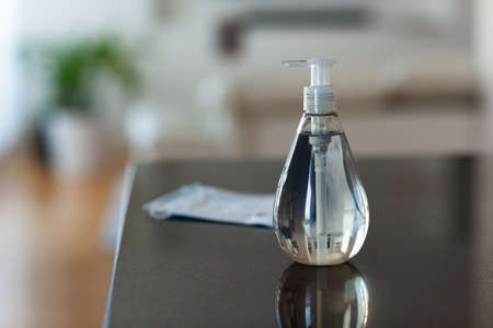 Antibacterial antiseptic hand sanitizer gel bottle and surgical masksの写真素材