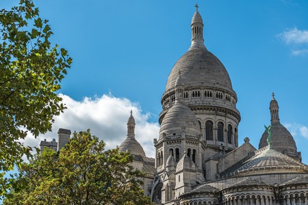 Sacre Coeur Basilique on Montmartre, Paris, France in sunny dayの写真素材