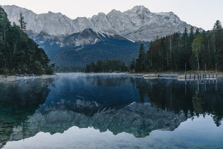 mountain lake Eibsee in Bavarian Alps in the morning with reflection, Germany, Europeの写真素材