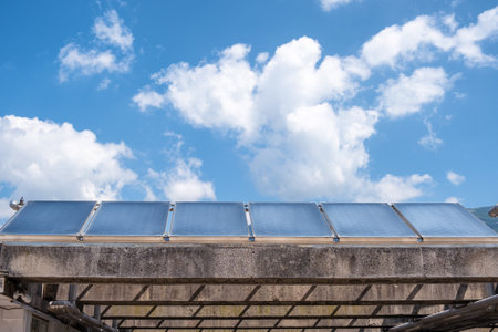 Solar panels on roof of car parking in Montenegro. Sustainable energy, electric power generation. Renewable green energy saving efficient photovoltaic solar cellsの写真素材