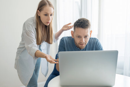 Shocked woman caught her man watching pornography video and cheating with mistress on laptop at...