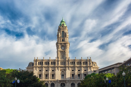 Porto City Hall building in Neoclassical architecture style with clock tower at sunrise, Oporto,...