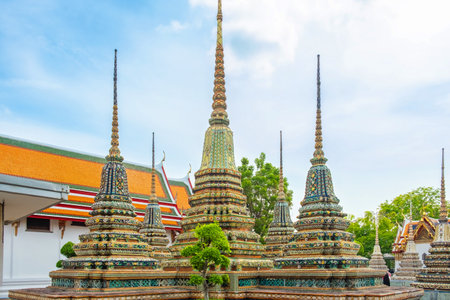 Thai Stupas in Wat Pho Temple Complex in Bangkok city with traditional Buddhist architecture in Thailand, Asia. Temple of the Reclining Buddha. Popular tourist landmarkの写真素材