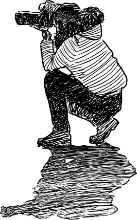 Vector sketch of a photographer shooting.のイラスト素材