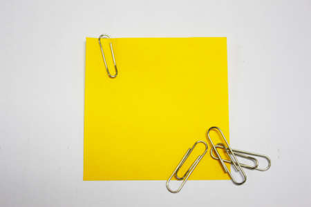 Blank note with paperclipsの写真素材